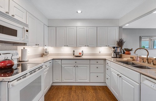 Olympia House | Sprawling lakefront property with kayaks, large deck, game table, & fireplace