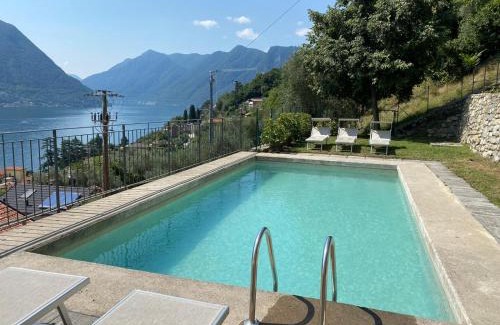 Sala Comacina Apartment | State of the art home suite with 180 degree panoramic lake view, pool and spa sleeping up to 10 guests by Italian Apartments