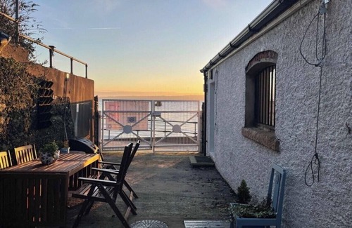 Whiteabbey Cottage | Stay beside the sea - Coastguard Boathouse - self contained cottage.