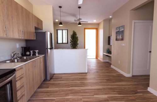 Leeward Settlement Apartment | Stay in a Long Bay Beach Villa with a Shared Pool