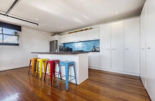 Collingwood North Apartment | StayCentral - Fitzroy Converted Warehouse Penthouse - Rose St, Fitzroy - 2 Bedrooms, 2 Beds, 1 Bathrooms, 1 secure undercover parking spot and 1 permit for street parking.