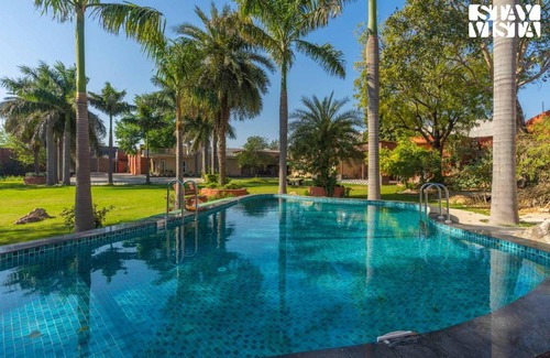 Faridabad Villa | StayVista at Palash Van Luxury 3BR Private Pool Villa in New Delhi with Bonfire, Wi-Fi