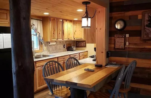 Sabinsville Cabin | Stone fireplace, Kingsize beds,3 baths,3 bdrms,2 creeks,10 acres,covered decks,