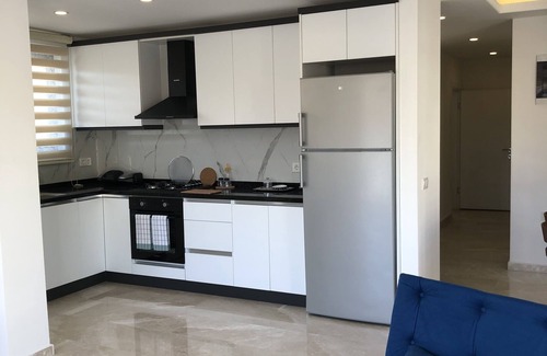 Kalkan Apartment | Stone House Aparts Kalkan with large terrace on the ground floor