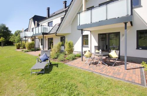 Lobbe Apartment | strandnahe FeWo mit Terrasse, gratis Nutzung vom AHOI Erlebnisbad und Sauna in Sellin - Rex Rugia FeWo 13-2
