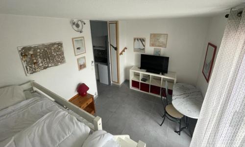 Le Couchant Apartment | Studio a la mer piscine wifi parking clim