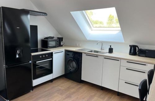 Boue Apartment | Studio Centre Bourg Arrivée et Départ Autonome