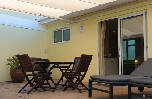 Constantia Ski Chalet | Studio in its own little house with nice terrace covered by a big awning