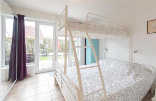 De Haan Apartment | Studio Siena with parking and shared pool by Interhome