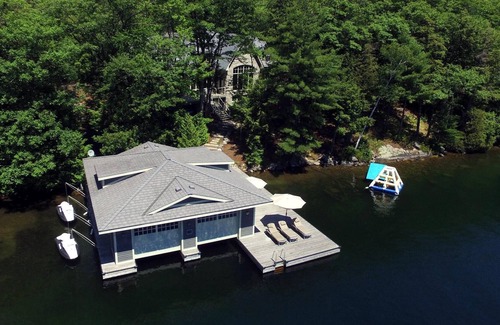 Muskoka Lakes Villa | Stunning Cottage on Lake Joe! 6 bdrm,6 bath,2 slip boathouse! Water Toys Galore!