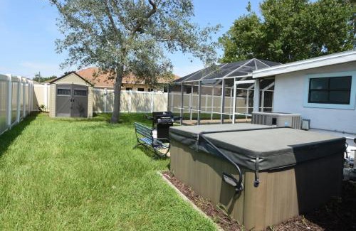 Palm Harbor House | Stunning Fenced Home with Heated Pool & Hot Tub