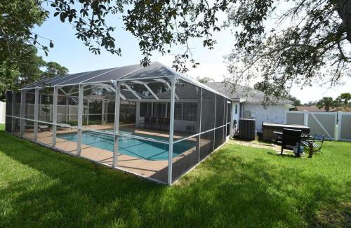 Palm Harbor House | Stunning Fenced Home with Heated Pool & Hot Tub