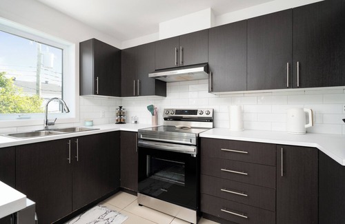 Laval Apartment | Stunning, fully furnished unit with brand new furniture throughout.