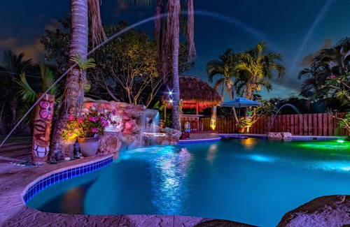 Lake Worth House | STUNNING RETREAT pool, waterfall, beach, tikis, 3 BD