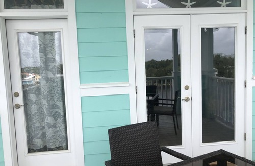 Steinhatchee Condo | Stunning Top Floor Views of The Steinhatchee River with Private Boat Slip/Pool!