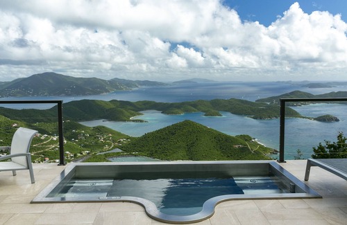 Lower Carolina Villa | Stupendous views and steps away from a resort class pool and custom spa.