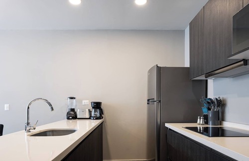 Monterrey Apartment | Stylish Apartment: Pool, Gym & Mountain Scenery