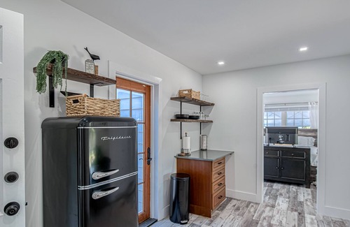 Poiciana Park II Apartment | Stylish, dog-friendly home with a pool, enclosed yard, patio, & central AC