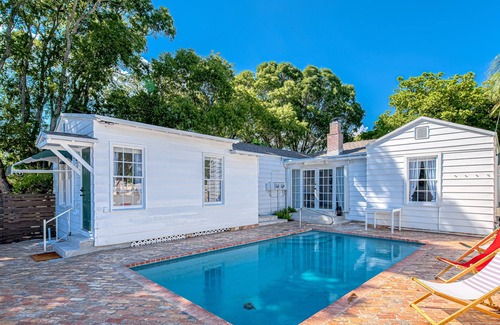 Poiciana Park II Apartment | Stylish, dog-friendly home with a pool, enclosed yard, patio, & central AC