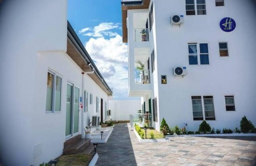 Prampram Apartment | Stylish Escape with Pool at H Village