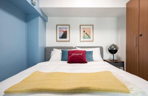 Bagumbayan Apartment | Stylish loft, 65 in UHDTV w Fast WiFi + Pool & Gym