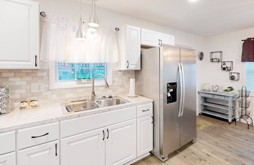 Charlotte House | Stylish & private guesthouse with sunny patio, central AC, & W/D - with pool