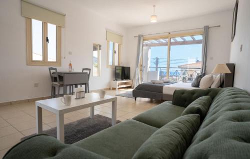 Peyia Town Apartment | Stylish Studio with Pool and Balcony Hillside and Sea Views For Business or Leisure Travellers