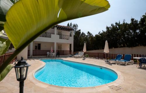 Peyia Town Apartment | Stylish Studio with Pool and Balcony Hillside and Sea Views For Business or Leisure Travellers