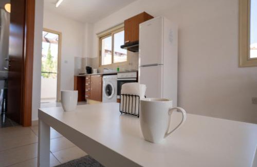 Peyia Town Apartment | Stylish Studio with Pool and Balcony Hillside and Sea Views For Business or Leisure Travellers