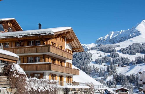 Adelboden Apartment | Stylishly furnished vacation apartment near the mountain railroads.