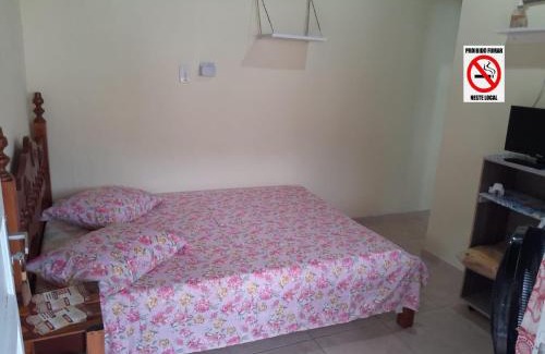 Praia da Enseada Apartment | Suíte externa com entrada independente