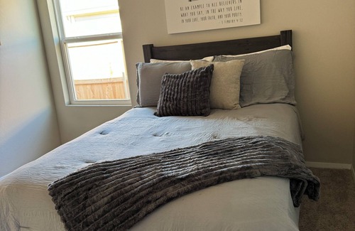 Broken Arrow House | Suburban Retreat with Cozy Comforts