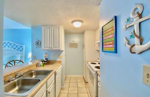 Orange Beach House | Sugar Beach 122 by ALBVR - Nice Studio condo with new sofa, AC and 32 inch Smart TV