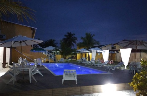 Barra Nova Villa | Suite with simple decor, balcony, hammock, air conditioning, minibar and smart TV