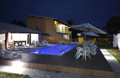 Barra Nova Villa | Suite with simple decor, balcony, hammock, air conditioning, minibar and smart TV