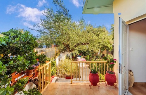 Kalamata House | Summer Rose Garden Getaway - A Step to the Beach