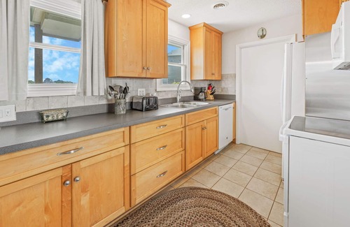 Brigands' Bay House | SUMMER SAVINGS - Soundfront Home in Frisco with Hot Tub and Private Dock