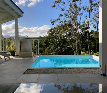 Petit-Bourg House | Sun7 appart T2, avec piscine partagée, logement moderne et cosy