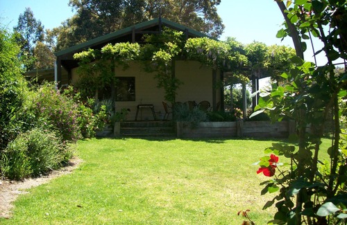 Metricup Cottage | Sunflower Cottage set in a beautiful cottage garden