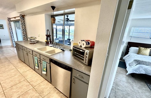 Lochmoor Waterway Estates House | Sunny Canal-Front Home w/Lanai & Grill!