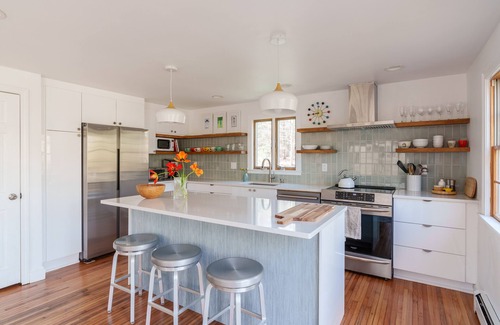Vineyard Haven House | Sunny, secluded midcentury beach house short walk to Lambert's Cove-year round