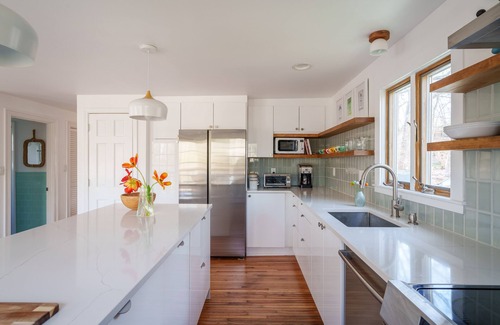 Vineyard Haven House | Sunny, secluded midcentury beach house short walk to Lambert's Cove-year round