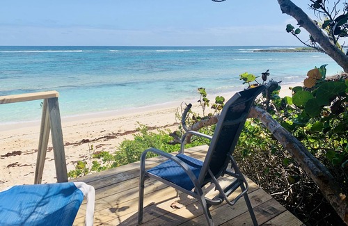 Governor's Harbour Apartment | Sunset apartment at Casuarina Bay, beachfront with western sunset views