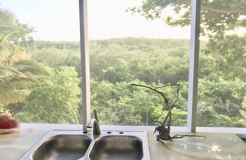 Governor's Harbour Apartment | Sunset apartment at Casuarina Bay, beachfront with western sunset views