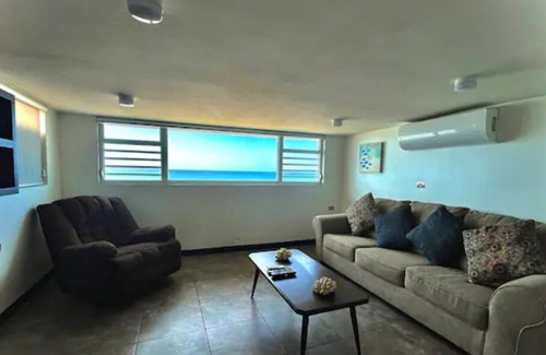 Aguadilla Pueblo Apartment | Sunset View Window w/ King Bed, Modern Beach Apartment