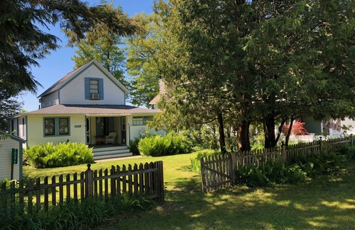 Alden Cottage | Sunsets & Private Sandy Beach Cottage on Torch Lake in Alden