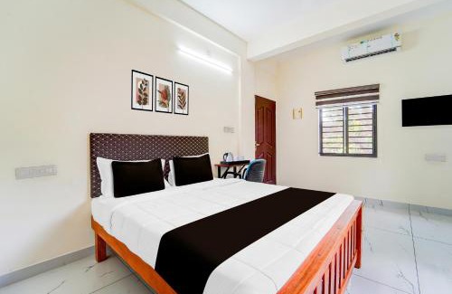 Kalamassery Hotel | Super Hotel O HMT Colony Kochi Formerly Pullans Arcade