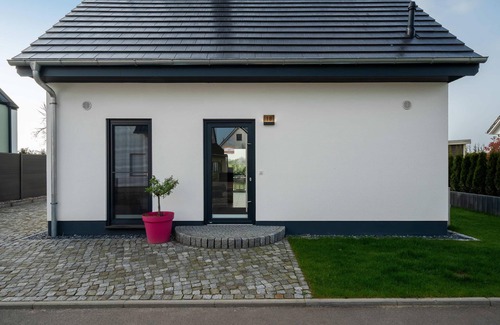 Muritz House | Sustainable Duncan House with fireplace, 3 bedrooms with en-suite bathroom