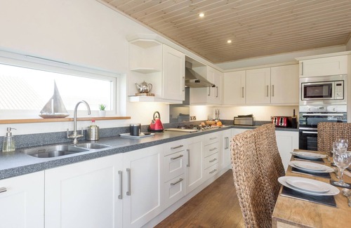 Hopton Cottage | Swedish timber-style house, with sauna and hot tub, on a 400-acre estate.