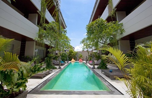 Sunset Road Apartment | Swiss-Belcourt Sunset